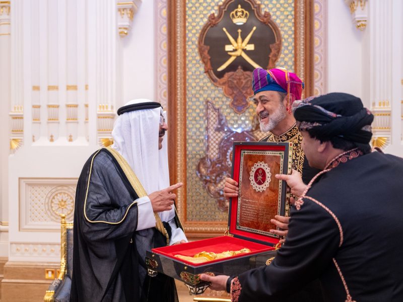 His Majesty the Sultan and His Highness the Emir of the State of Kuwait exchange medals and souvenirs